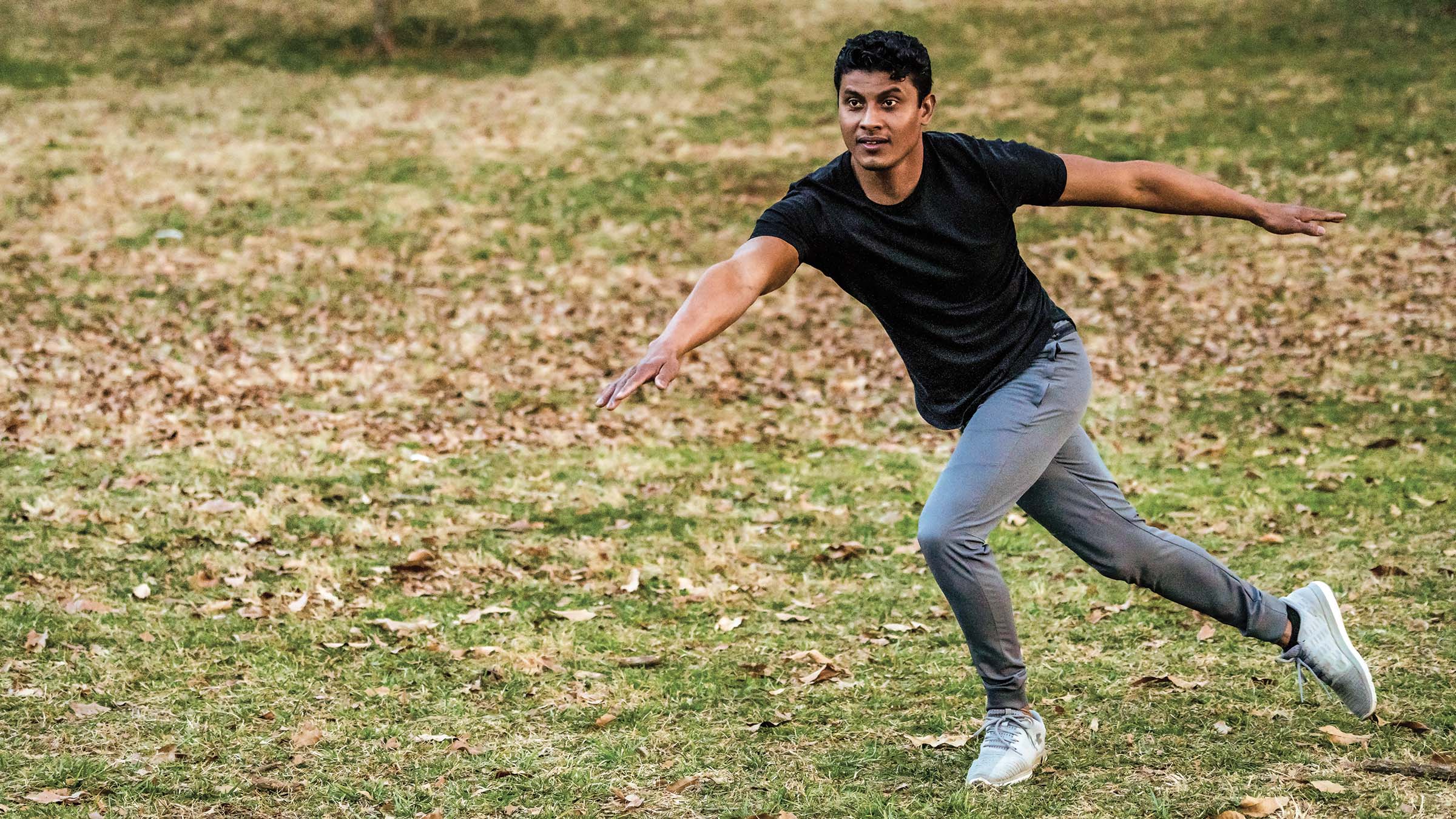 Man doing skater jumps