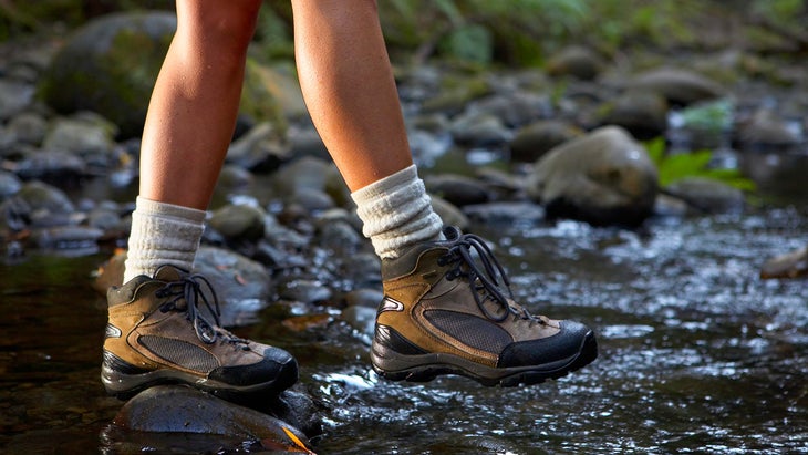 Hiking boots in stream