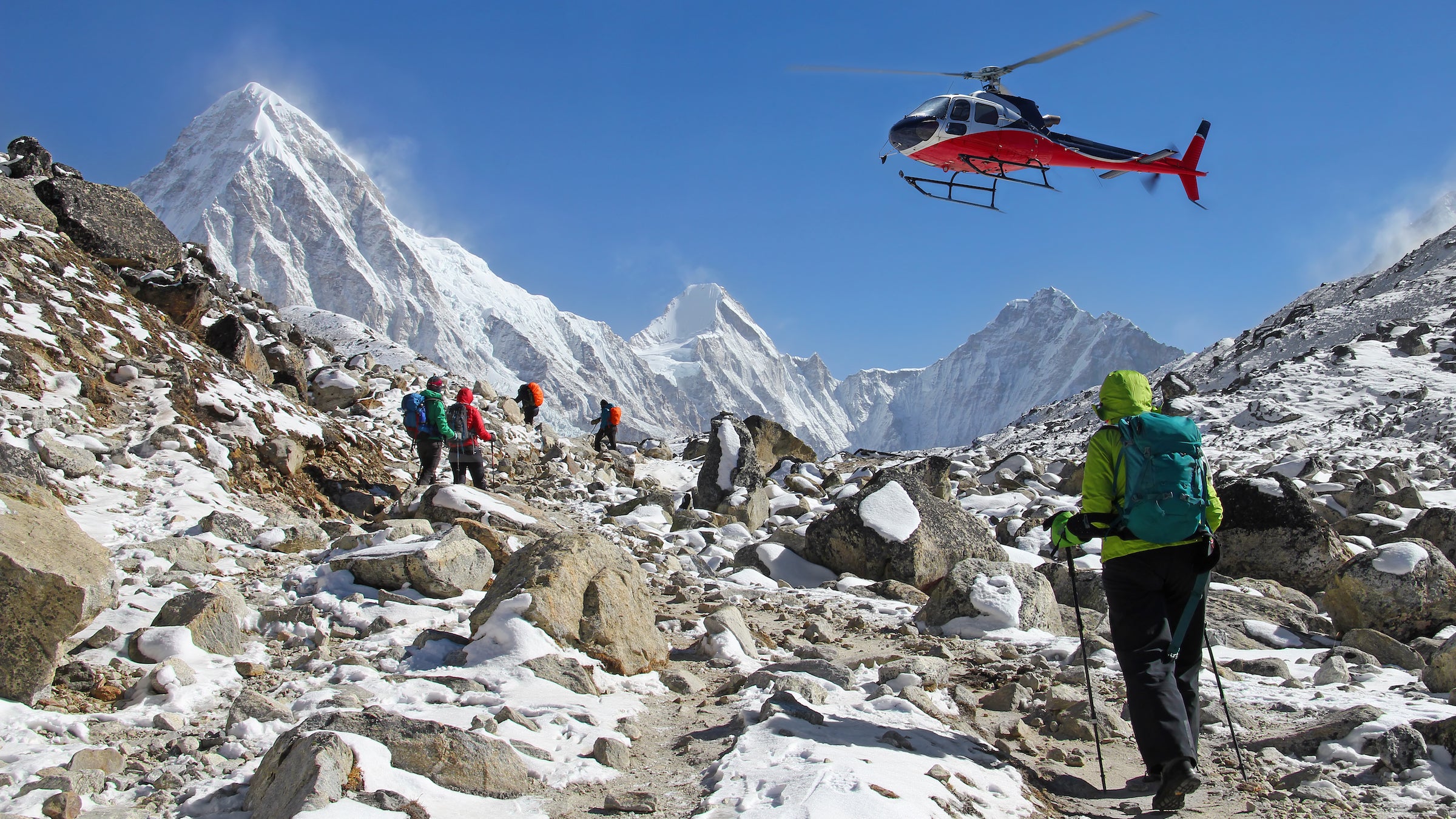 search and rescue helicopter in the mountains