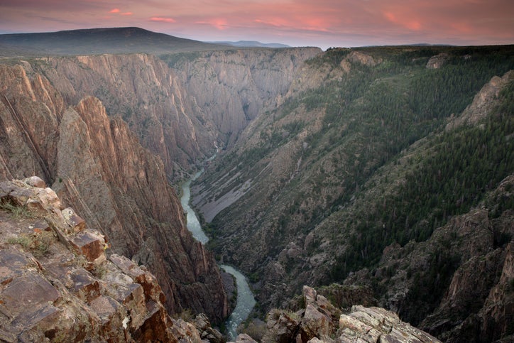 A pink sky over the Black Canyon.