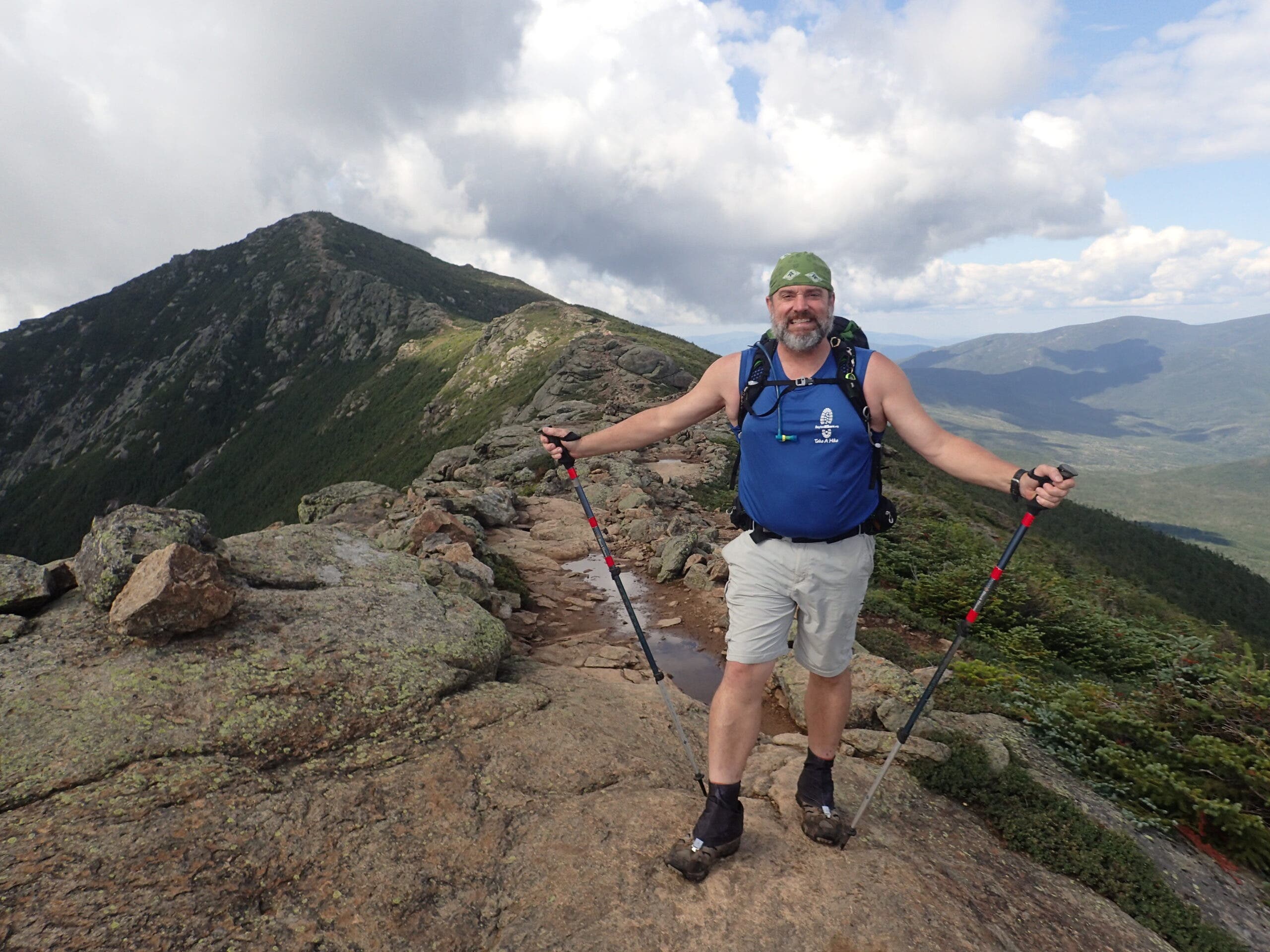 Andy Niekamp standing on a ridge in the White Mountains