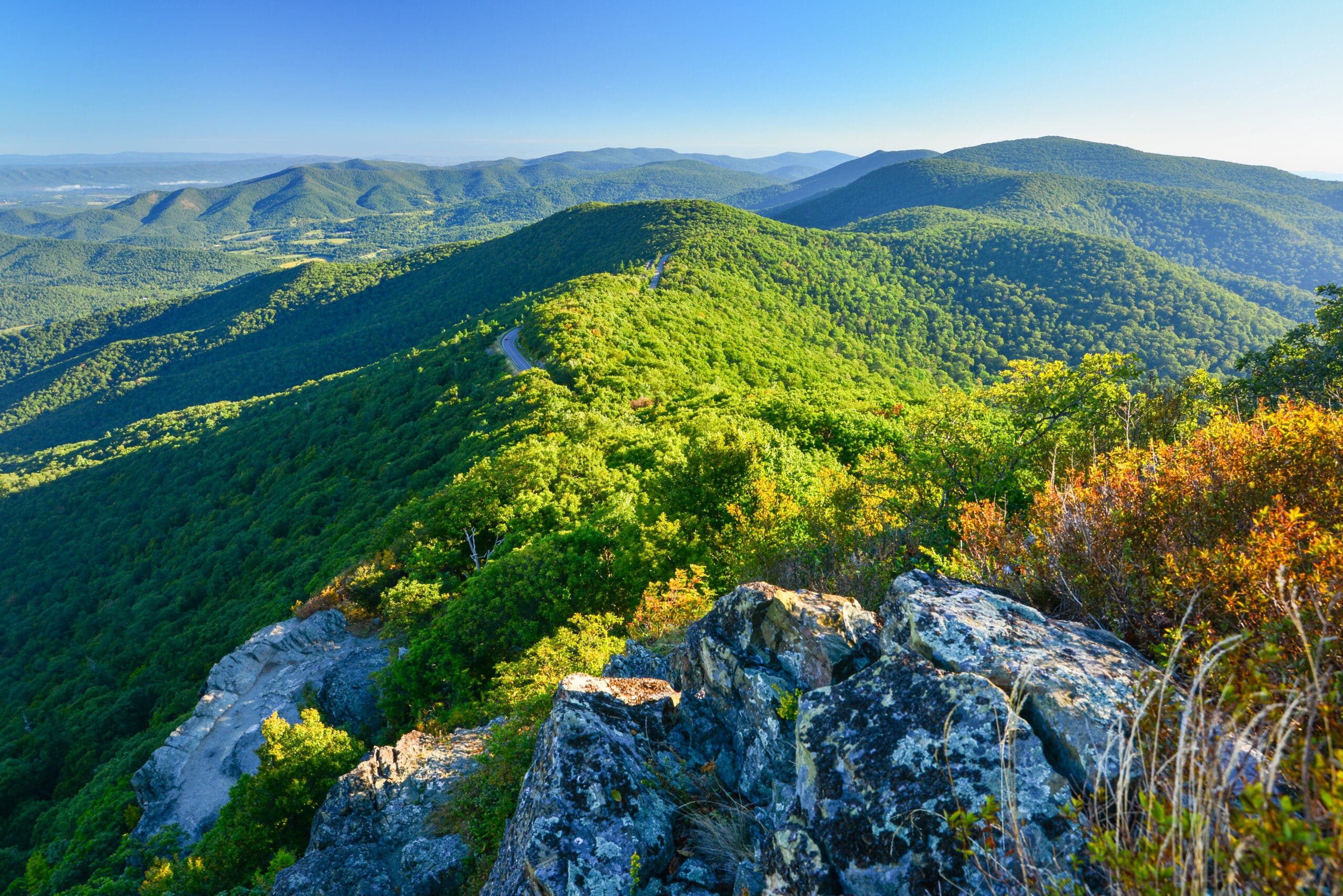 a rocky ridgeline looking out on the lower sections of the ridge crest