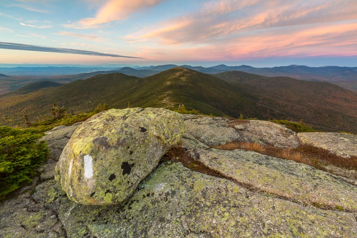 the summit of Saddleback Mountain Maine with high peaks in the background