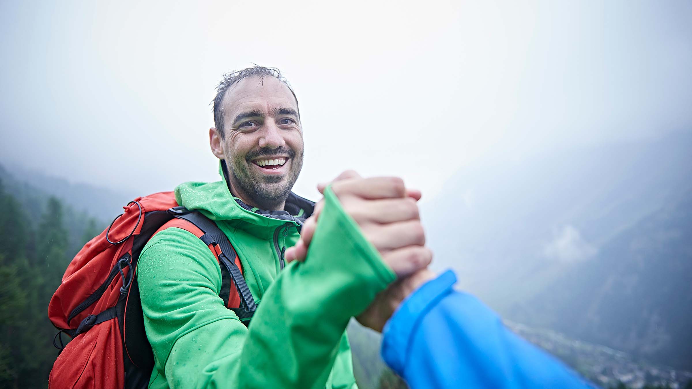 hikers shaking hands