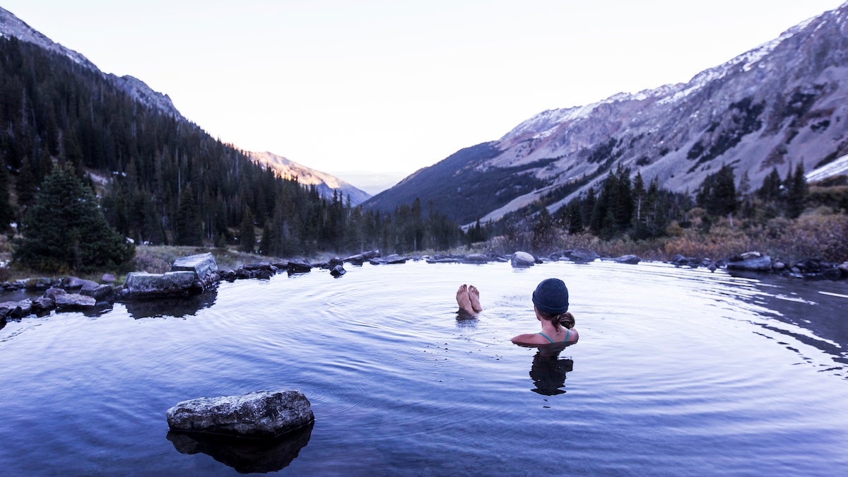 A woman soaking in a hot spring.