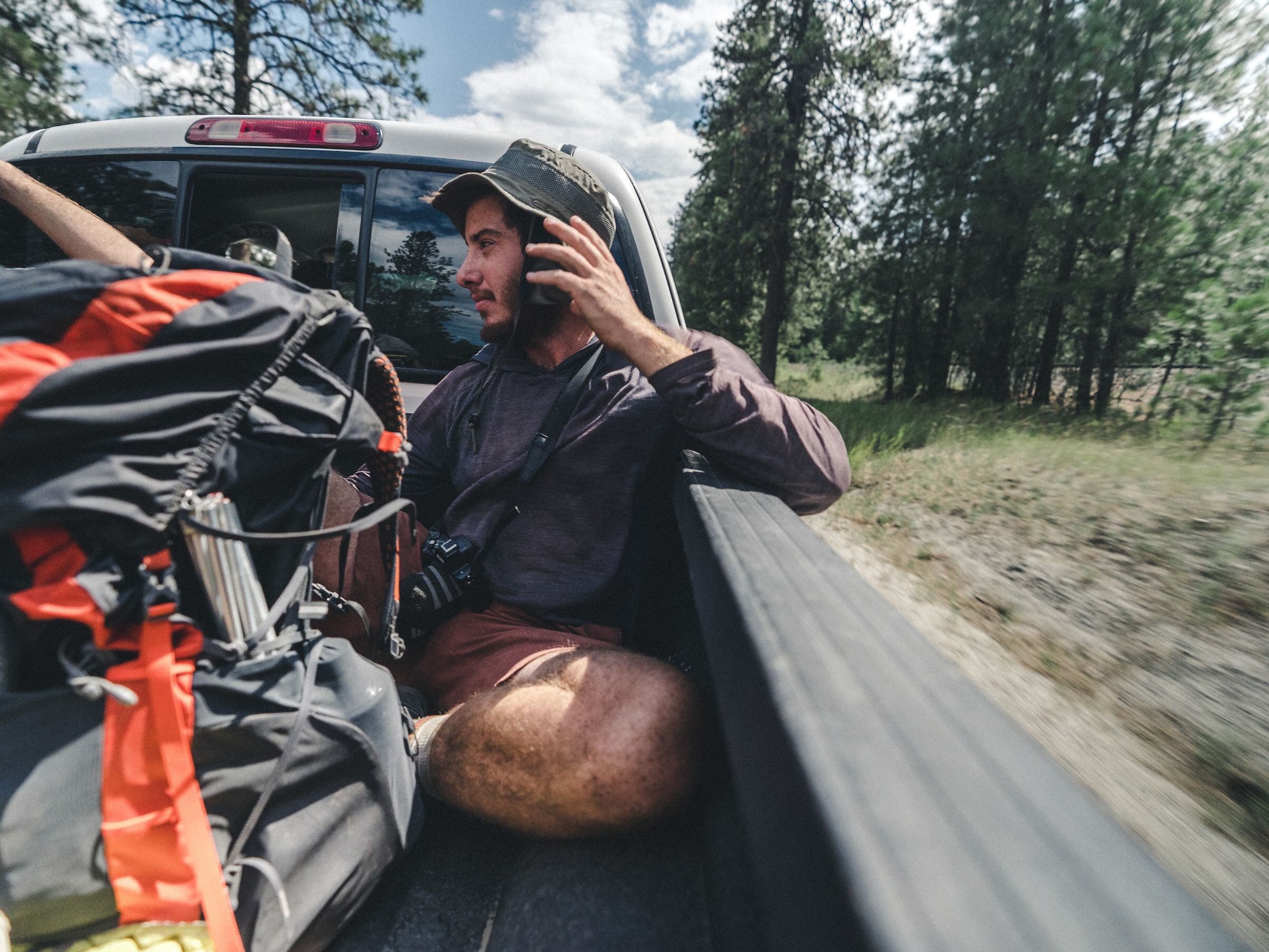 Why are we in the back of a stranger’s pickup, flying down a byway? To get our resupply of course!
