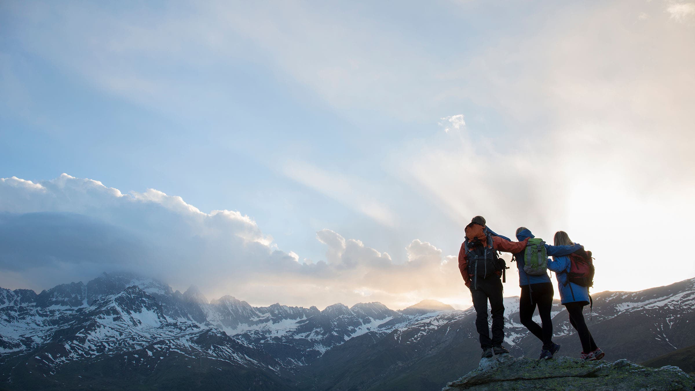 hikers on top of a peak