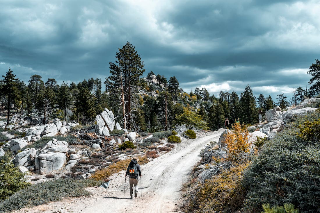a single hiker along the trail at highlander