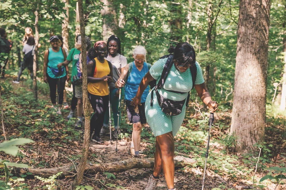 refugee women hiking on trail