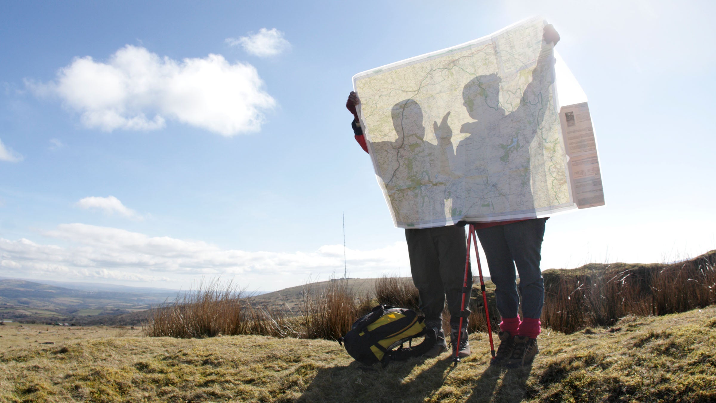 hikers looking at map