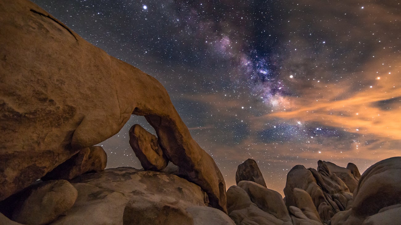 Scenic View Of Joshua Tree Rocks At Night