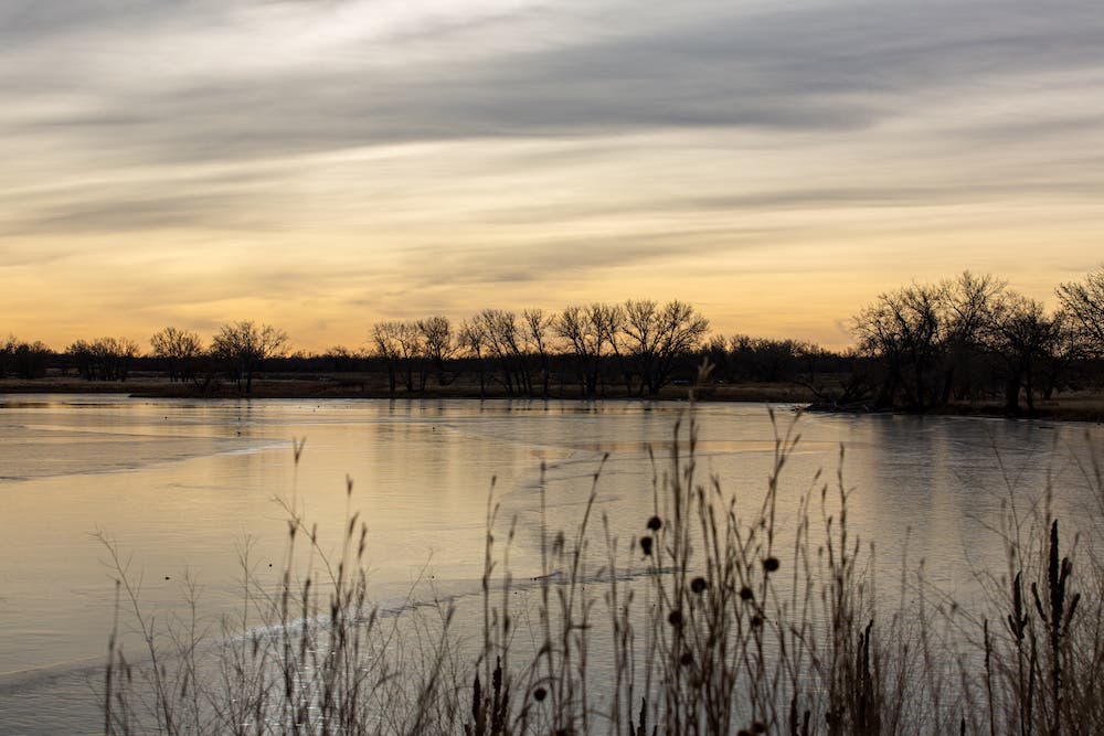 Rising sun over Ladora Lake