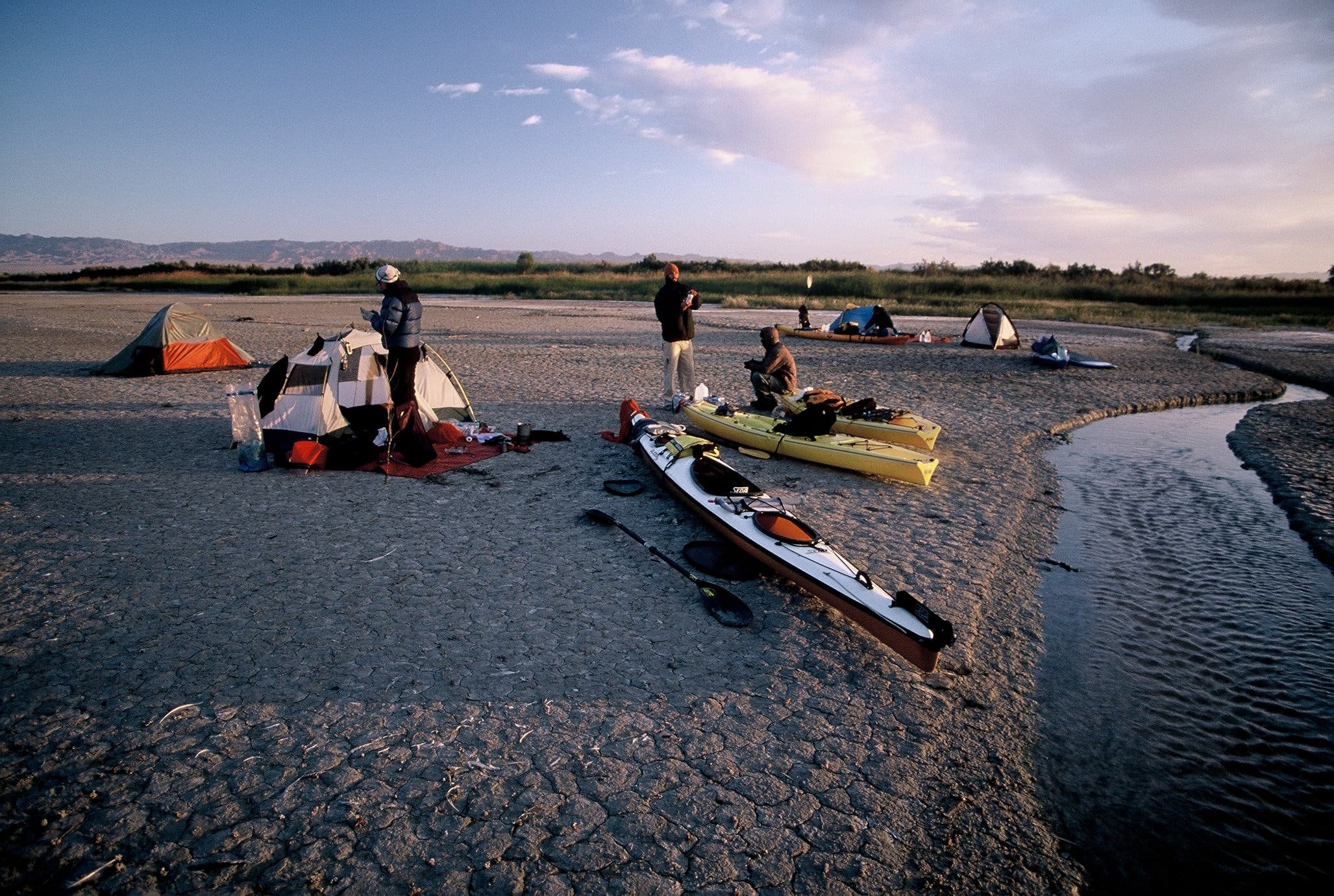 kayakers on mudflat