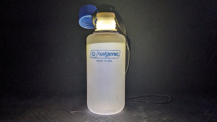 Nalgene lit up by headlamp