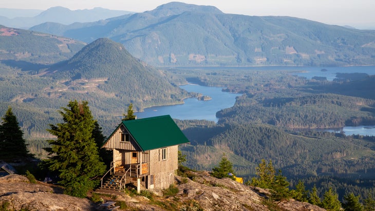 Hut on mountain overlooking a broad valley