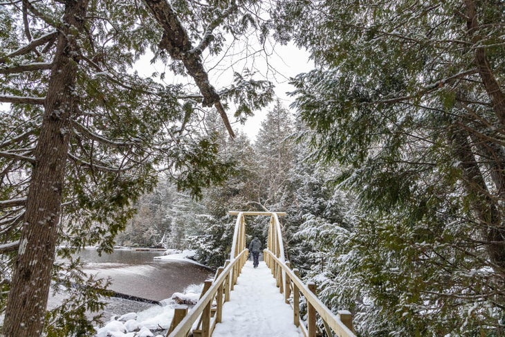 jackrabbit trail in new york, snowy trail on bridge