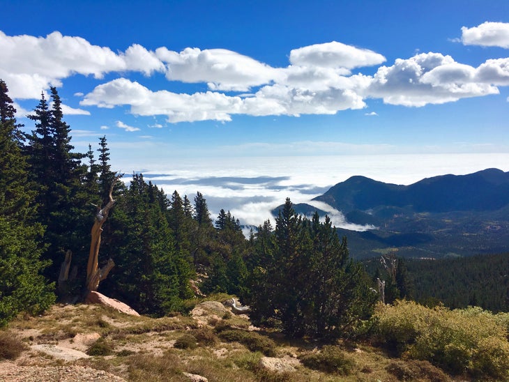 cloudy valley from trail on pikes peak