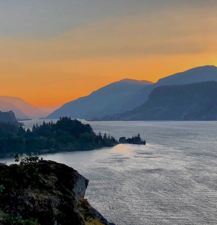 Columbia River Gorge A view of the Columbia River Gorge, one of the most beautiful gorges in the United States, backlit by a glowing, golden sky.
