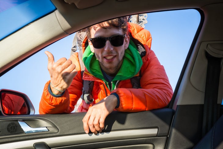 young male hitchhiker