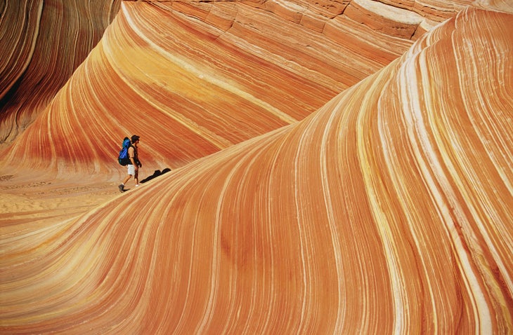 Man Backpacking at Vermilion Cliffs
