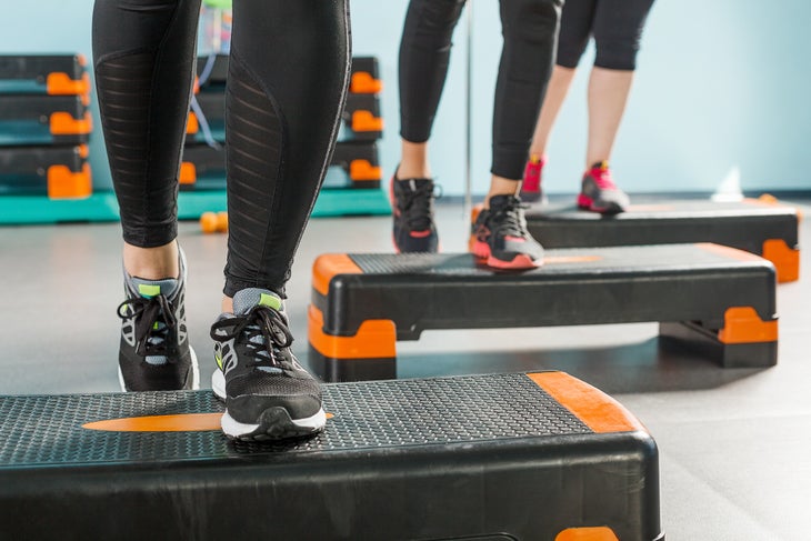 Close-up view of female legs exercising in gym