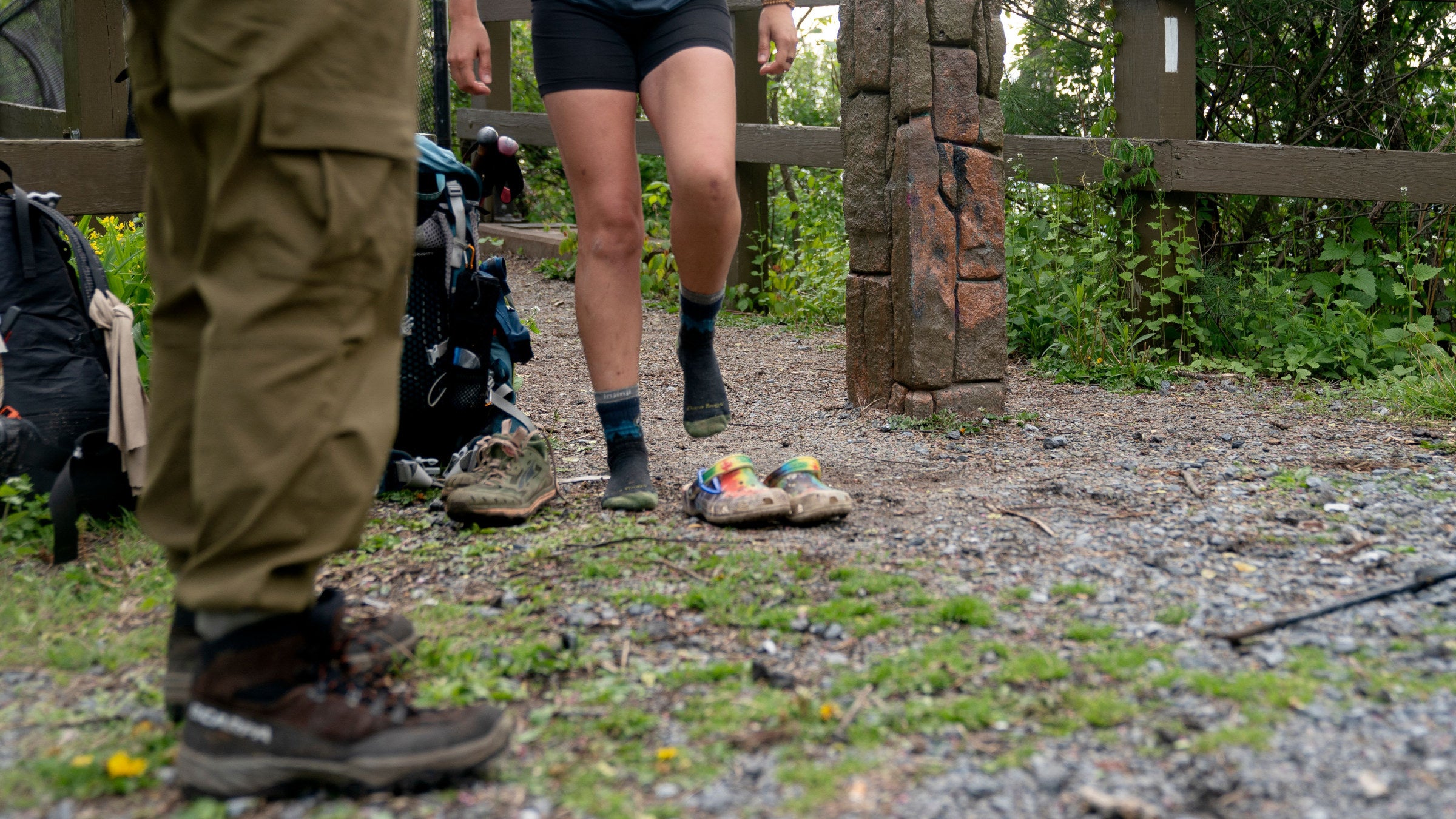 Hiker changing shoes