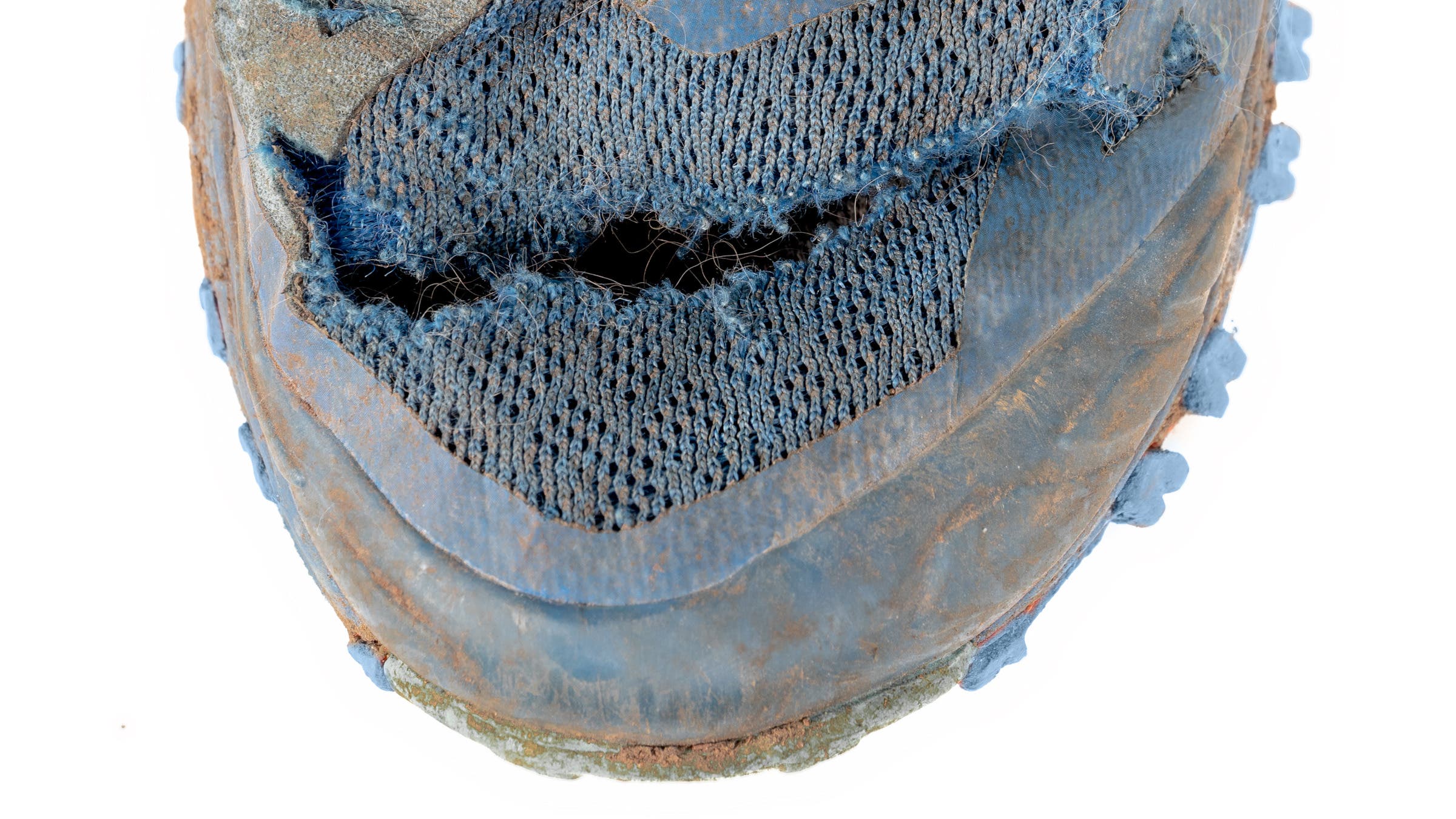 ripped hiking shoe