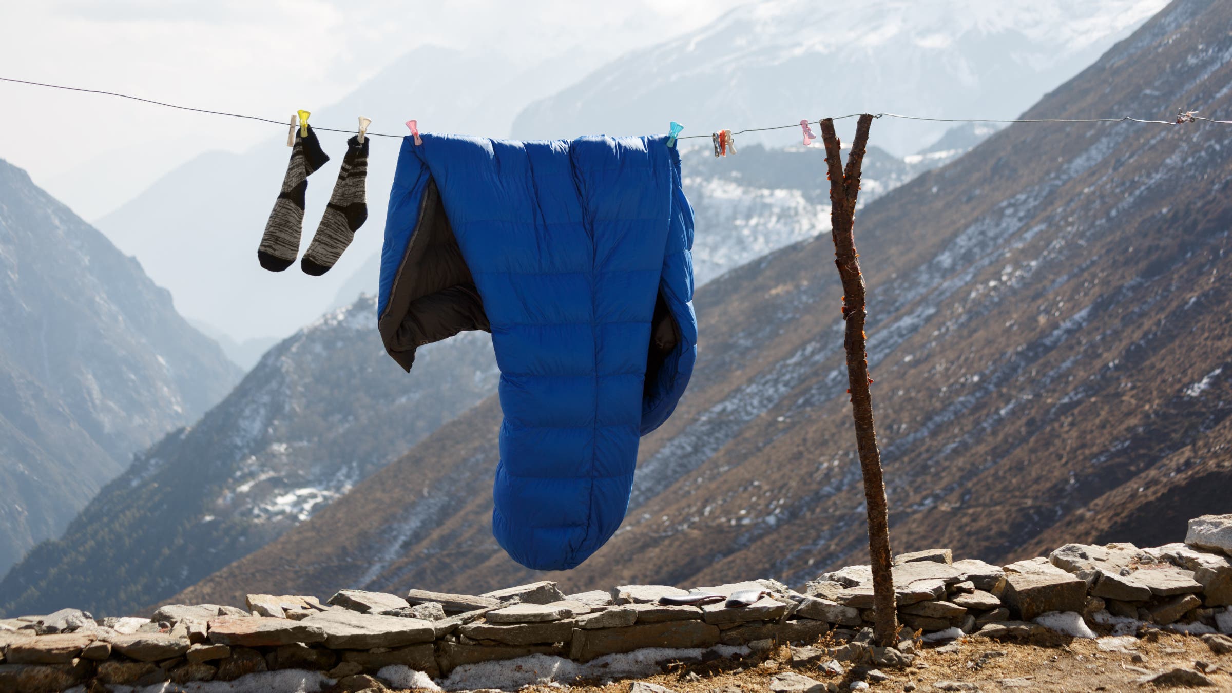 Sleeping bag and socks on drying line