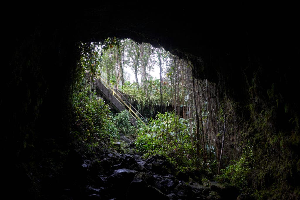 Entrance of Kaumana Caves, a massive 1881 lava tube cave formed by Mauna Loa on the Island of Hawai'i.