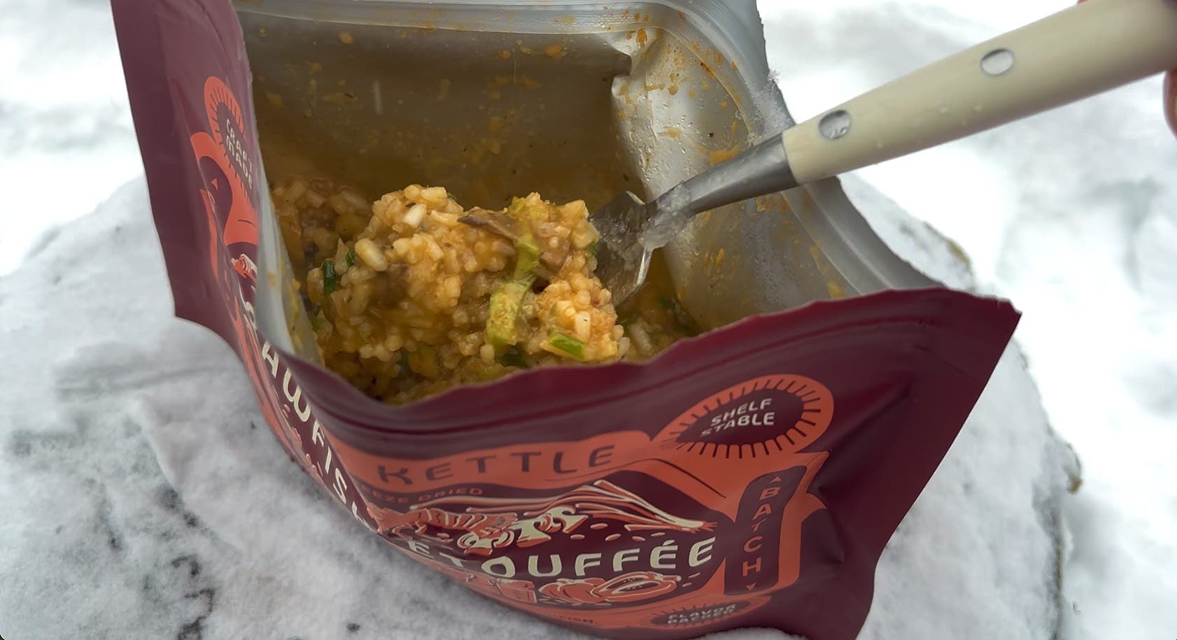 Bowl & Kettle's rehydrated crawfish etouffe backpacking meal, shown with a fork