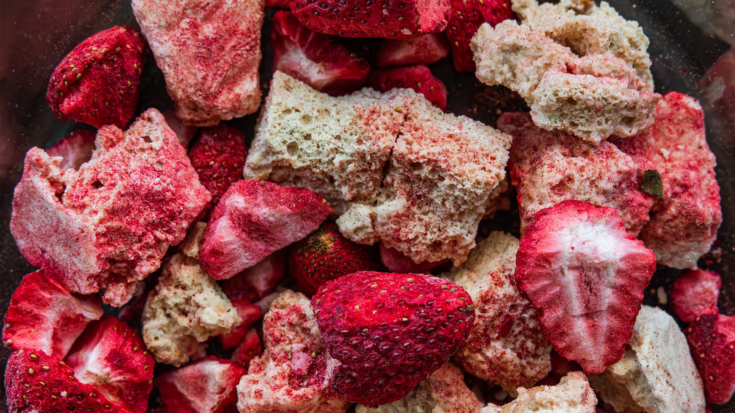 dehydrated tres leches cake and strawberries in a pouch