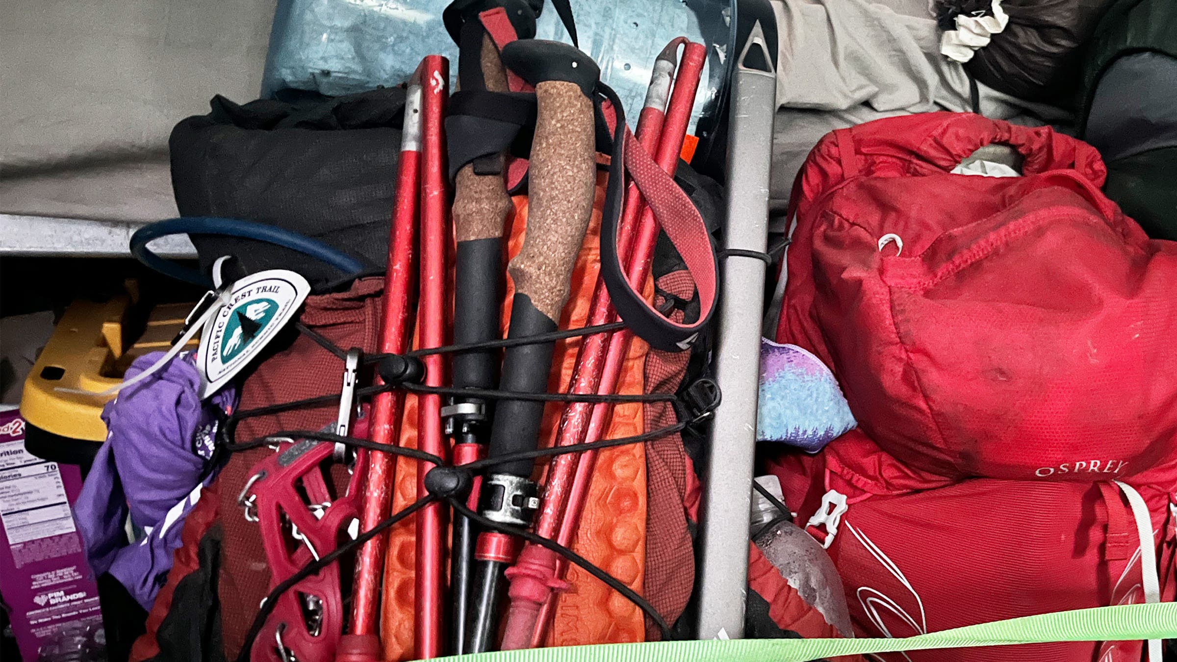 a backpack with gear strapped to it