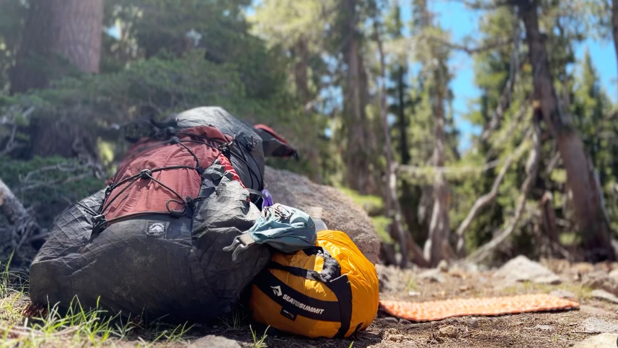 a backpack laying on the ground