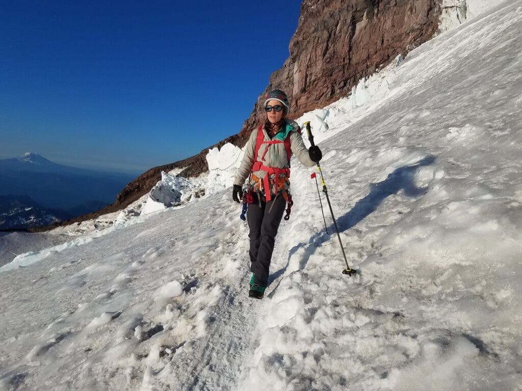 A hiker climbing Mt. Rainier