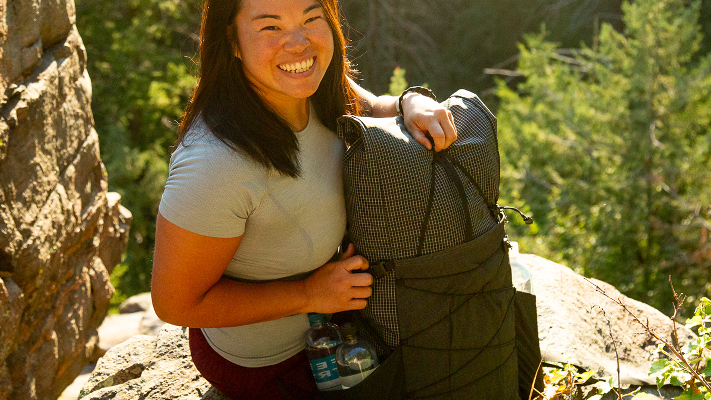 A backpacker with the Aspen 38 pack