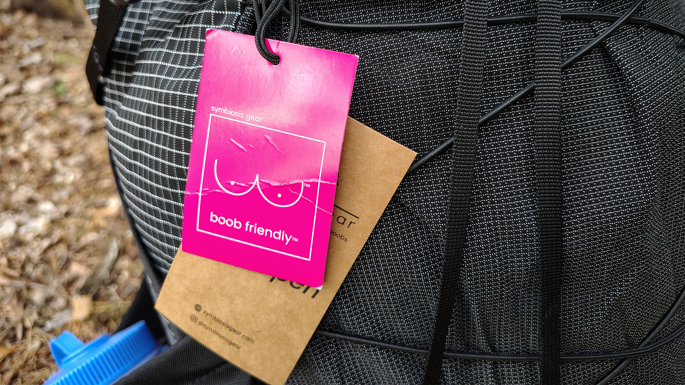 Symbiosis Aspen 38 pack with a tag that reads "owl friendly"